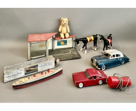 A small collection of vintage toys - comprising a boxed 1960s Mettoy Computacar; a Hong Kong plastic battery operated remote 