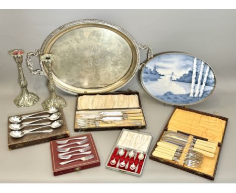 A collection of silver plated ware - comprising an early 20th century two-handled oval tray, 63.25cm long; a pair of 19th cen