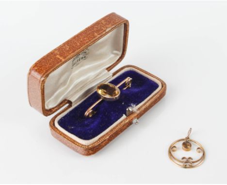 A vintage 9ct yellow gold and citrine bar brooch - unmarked (tests as 9ct), with a 13 x 9.5mm oval cut citrine, 36mm long; to