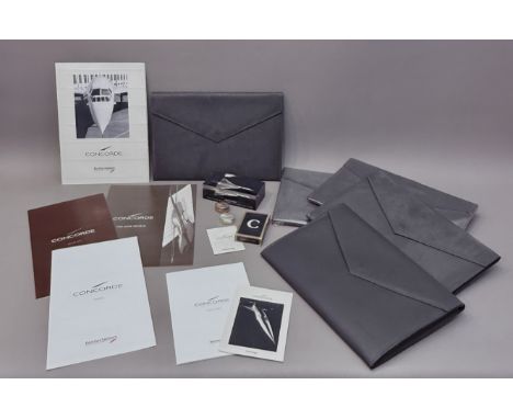 A group of British Airways Concorde memorabilia - comprising two hallmarked silver oval pill boxes, Sheffield 1992; a 'First 