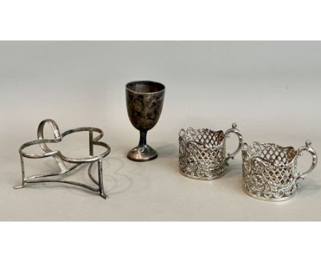 Four small silver items - including a George VI trefoil cruet stand; a pair of Edwardian silver coffee cup holders; and a sma