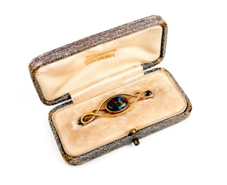 An Art Nouveau 15ct yellow gold and black opal brooch by Murrle Bennett &amp; Co - stamped '15CT MBo', the oval 11.5 x 9mm op