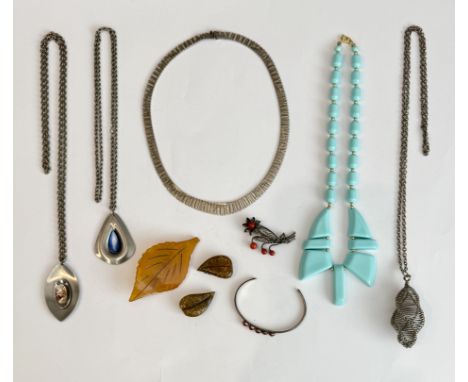 A small group of vintage jewellery - 1950s-70s, including a bright cut silver fringe necklace, Birmingham 1975 import hallmar