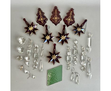 An unusual group of eight Victorian ruby glass and gilt hanging window lustre ornaments - or Christmas decorations, comprisin