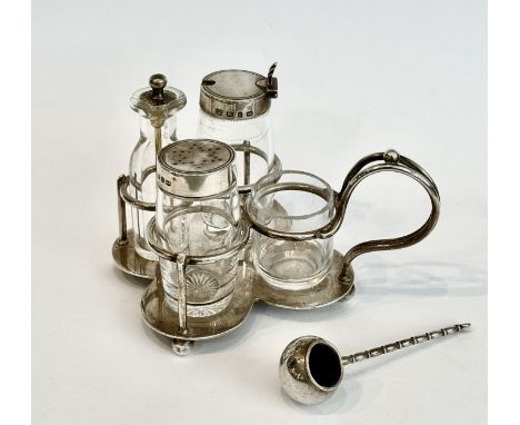 A late-Victorian silver and glass quatrefoil cruet stand - Hukin &amp; Heath, Birmingham 1895, comprising a barrel-shaped pep