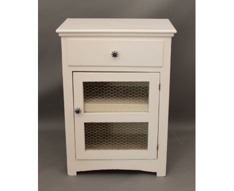 A white-painted larder cupboard - the single drawer and chicken-wire lined door with porcelain handles. (LWH 55.5 x 36 x 77cm