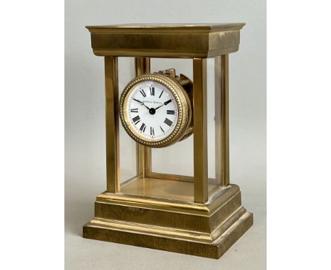 A gilt brass mantel or desk clock by Matthew Norman of London - single train movement with platform escapement, Roman white e