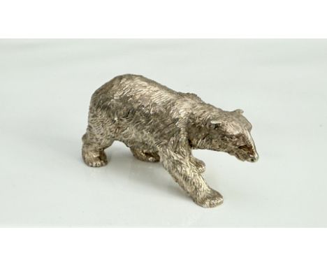 An Elizabeth II solid silver model of a polar bear - Simon Griffin Antiques Ltd, London 1999, 6.6cm long, weight 173g.