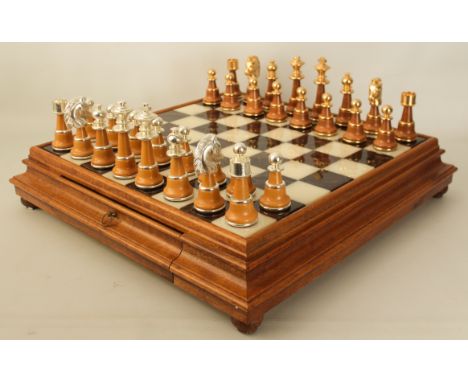 A large Italian chess set -&nbsp; the oak and marble board with piece-drawers (LWH 60 x 60 x 12 cm); the turned wood pieces w