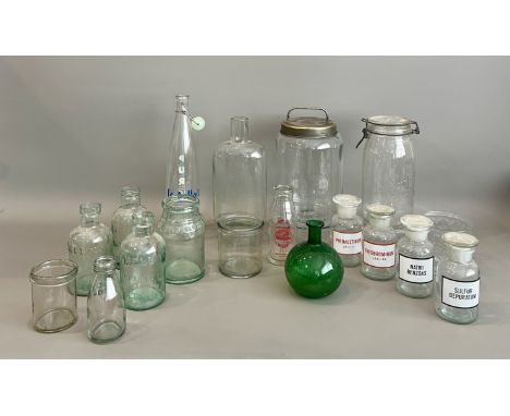 A collection of vintage glass kitchen jars, bottles and Kilner jars - including four pharmacy bottles with printed labels, 14