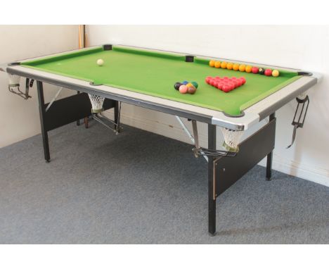 A half-size folding snooker / pool table - approx. 7ft x 4ft, with snooker and pool balls and six cues. (LWH 210 x 119 x 82cm
