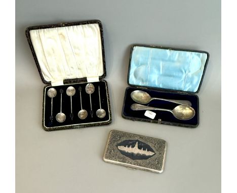 A Thai sterling silver and niello work cigarette case - the cover decorated with a depiction of Wat Pho, 13cm long, weight 14