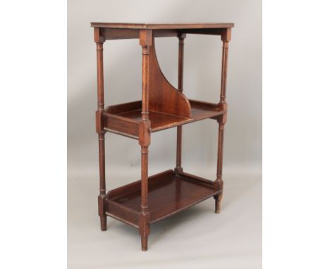 A mahogany three-tier &eacute;tag&egrave;re - early 20th century, the centre shelf with divider. (LWH 48 x 26.5 x 77.5cm)