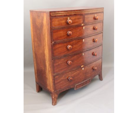 A mid-19th century bowfronted mahogany chest of drawers - brass-inlaid frieze, two short over four long graduated drawers wit