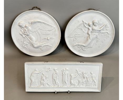 A pair of large Royal Copenhagen neo-classical biscuit porcelain plaques - circular, blue painted factory marks verso, one al