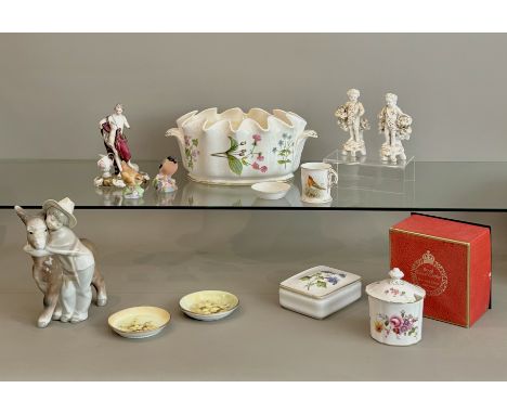 A small group of bone china and porcelain - including a Royal Worcester coffee can and pip dish painted with a robin, the cof
