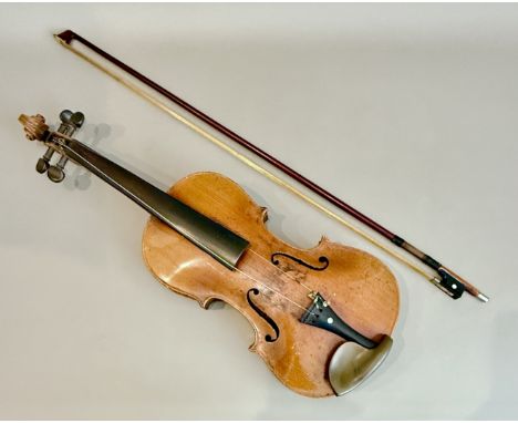 An early 20th century violin - with 14in two-piece back, inlaid purfling, ebony fingerboard, tailpiece and tuning pegs, 60cm 