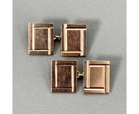 A pair of 9ct rose gold cufflinks - Deakin &amp; Francis, Birmingham 1949, rectangular with bevel-cut decoration.