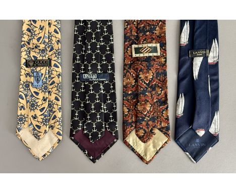 A small collection of silk designer neck ties - comprising one each by Dunhill; Joseph Arboug; Gucci; Lanvin; and Nina Ricci;
