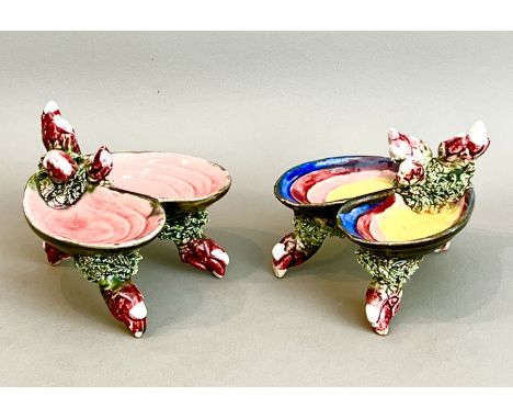 A matched pair of Palissy majolica double-salts - in the form of an open mussel shell with goose barnacle feet and handles, 9