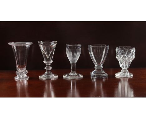 Five small late 18th / early 19th century small drinking glasses - including a Georgian deceptive toastmaster's glass, the he