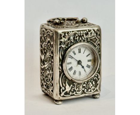 An Edwardian silver cased miniature carriage timepiece - William Comyns &amp; Sons, London 1902, the rectangular case with a 