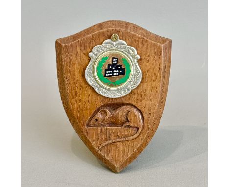 Robert 'Mouseman' Thompson (1876-1955): a mid-oak shield shaped prize plaque - with bevelled edge and fixed easel back, the f