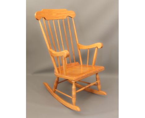 A beech and plywood rocking chair - (LWH 60 x 76 cm x 103.5cm)
