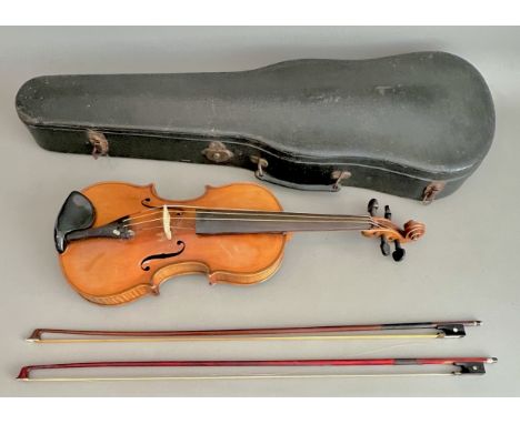 An antique Continental violin - probably late 19th century, label to interior of body 'Nach Amati Erzeugt von C. F. Schuster 