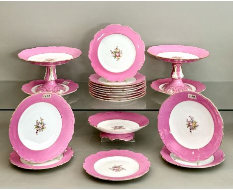A mid-19th century English porcelain part dessert service, probably by Coalport - comprising two comports, three pedestal dis