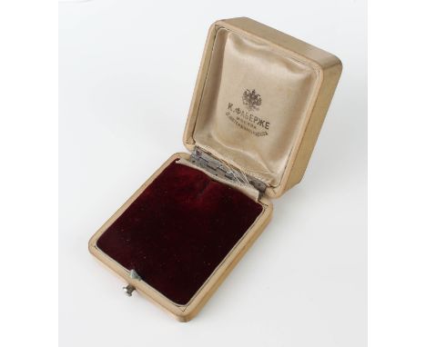 An original antique Faberg&eacute; pendant or necklace box - early 20th century, in pale wood with a claret red velvet and iv