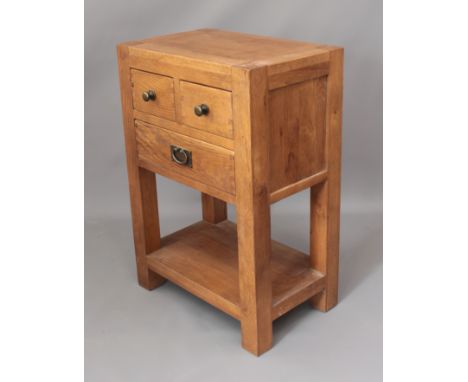 A modern mid-oak side table - with two short drawers over a long drawer, the block legs united by a platform undertier. (LWH 