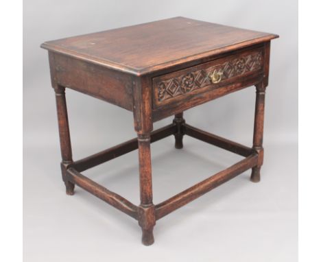 An 18th century style oak side table - first half 20th century, the single drawer with swan-neck handle flanked by carved ros