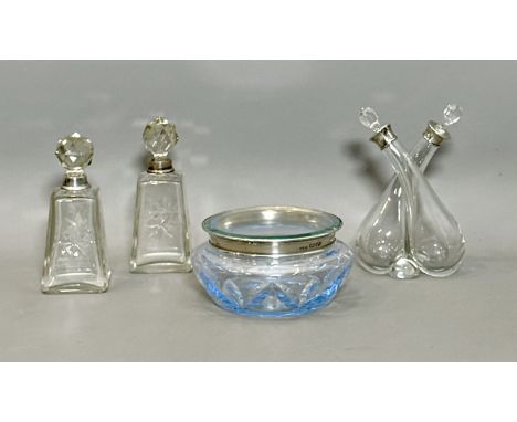 Four silver-mounted glass items - comprising a George V twin-vinaigrette / oil and vinegar bottle, Henry Perkins &amp; Sons, 