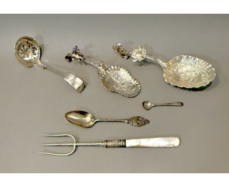 A small group of silver - comprising an Edwardian silver and mother of pearl bread fork, Isaac Ellis &amp; Sons, Sheffield 19