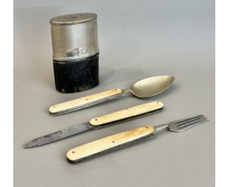 An early 20th century travelling / campaign cutlery set - comprising a folding steel bladed knife, silver plated fork and bra
