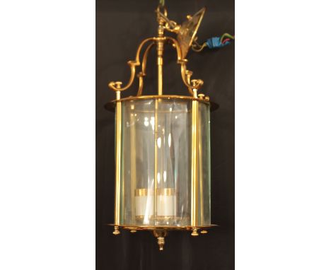 A brass hanging lantern in the 19th century style - with bevelled glass and three-light fitting, 61cm total drop from ceiling