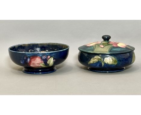 Two pieces of Moorcroft Pottery (both with restoration), comprising - 1. A Pomegranate pattern bowl, 1940s, impressed factory