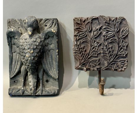 A 17th / early 18th century style carved wooden plaque - carved with in the primitive manner with an eagle, painted black ove