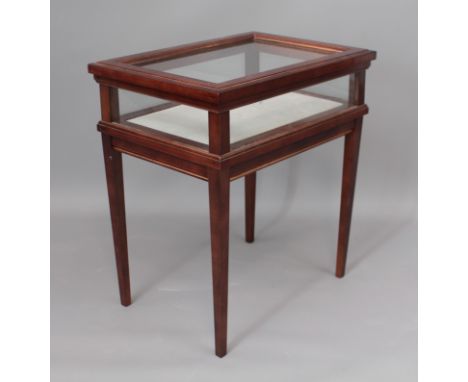 An Edwardian mahogany bijouterie cabinet - of small proportions, with removable cushioned light grey velour base, raised on s