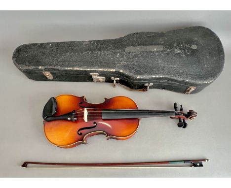 A West German violin - third quarter 20th century, Stradivarius label to interior of body, with 14 1/8in one-piece back, blac