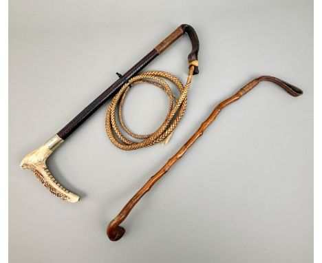 Two riding crops - 1. a hunting crop with staghorn hook and five-foot thong;  2. a polished thorn crop with knob handle and l