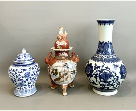 Three pieces of Oriental pottery and porcelain - comprising a large Chinese blue and white porcelain bottle vase, painted wit