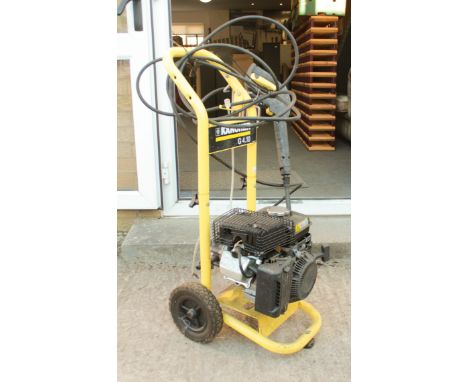 A Karcher G 4.10 pressure washer with instruction manual