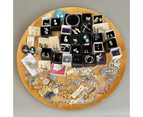A large collection of vintage and modern costume jewellery - including earrings, bracelets, necklaces and necklets, rings etc