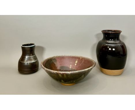 Three pieces of stoneware studio pottery - comprising a baluster vase by Matt Grimmitt, Winchcombe Pottery, dark brown iron g