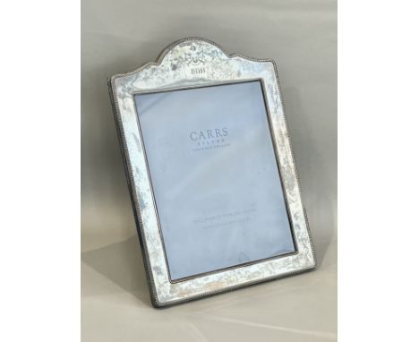 Hunting interest - an Elizabeth II silver photograph frame - Carrs of Sheffield, 2003, rectangular with a shaped top and bead