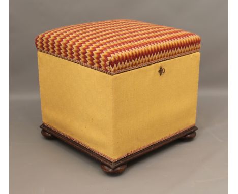 A Victorian ottoman - of cube form, the hinged, padded lid upholstered in flame-stitch tapestry, the interior fabric lined, t