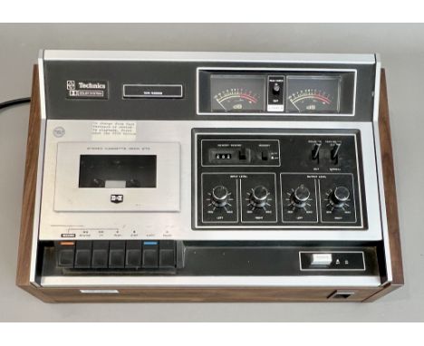 A vintage Technics RS-273USD top-loading hifi Stereo Cassette Deck - 1970s, with teak-effect and aluminium finished case, Dol