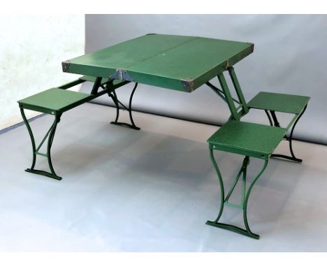 A 1920s-30s folding portable picnic table, the '"Flexion Legless Table" - in mottled green painted steel and fibreboard, the 